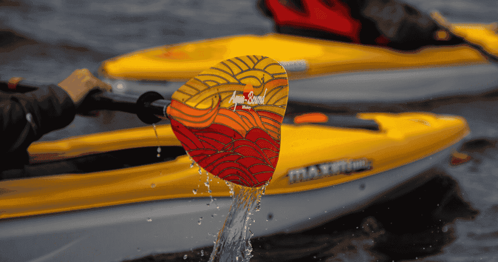 close up of aqua bound whiskey paddle ken whiting paddle tales paddletv facing waves