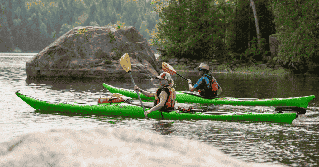 ken whiting and tour guide kayaking in les Laurentides, Québec paddle tales paddletv facing waves