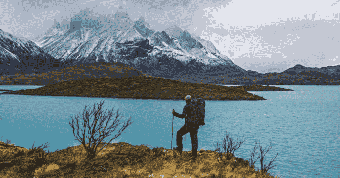 eric hanson overlooking a beautiful mountain landscape backpacking and hiking for beginners