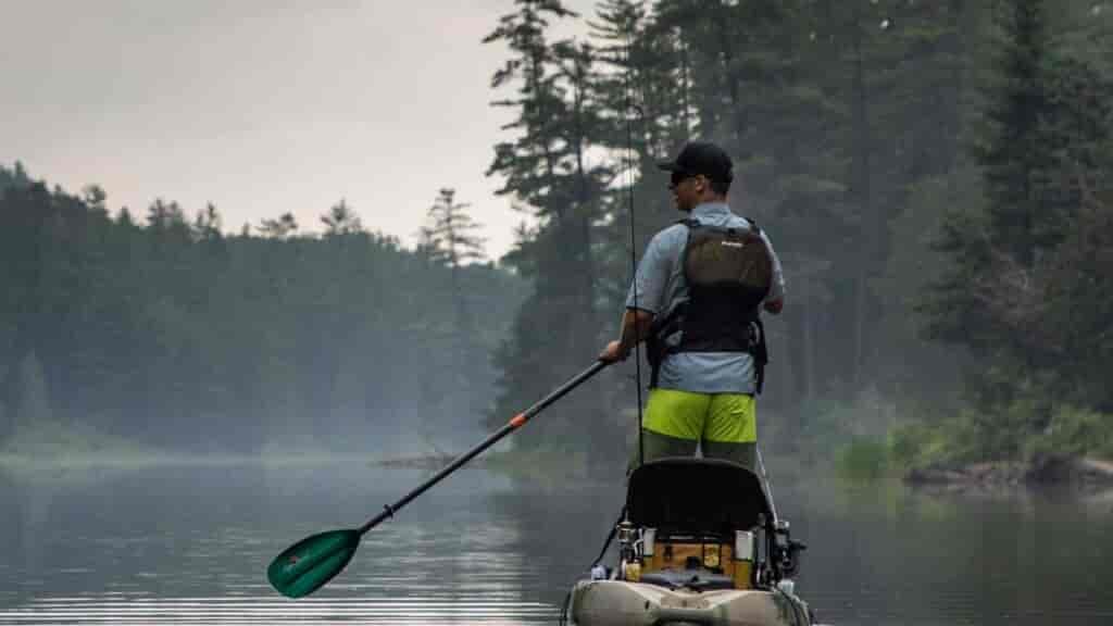 kayak lifejackets and PFD should be on at all times when on the water, where a kayak helmet doesn't need to be worn in flat water.
