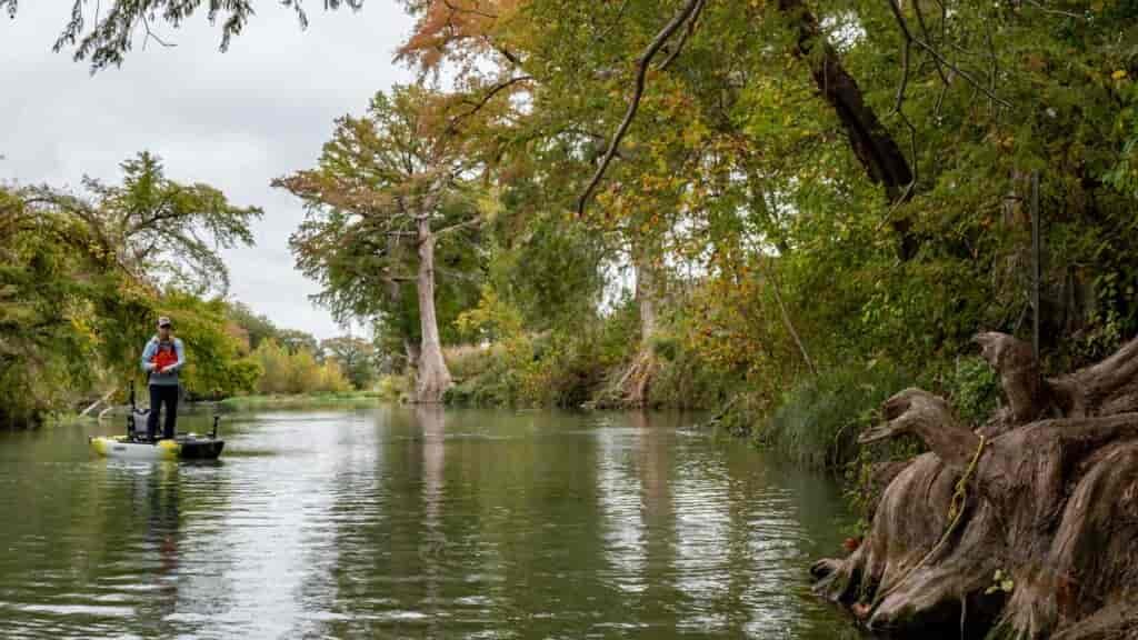 Working the shoreline while fishing for black bass in Texas