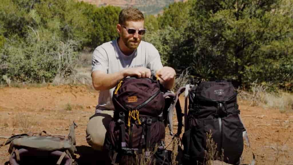 how to choose a backpack tip: Zippered zones can be very convenient for storing those items you need to get to quick