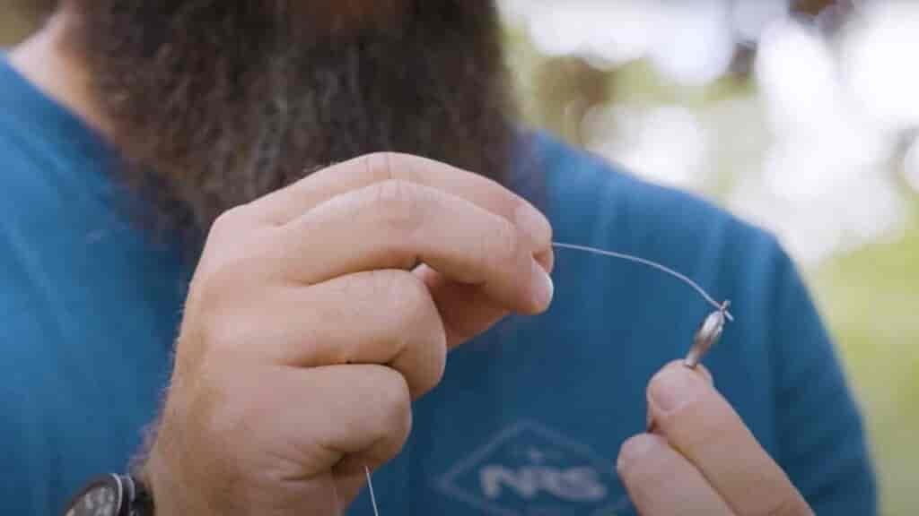 Step 2 - Pass the tag end through the eye of the jighead