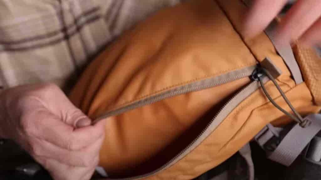 Bridger 35 straight zipper at the top makes it hard for stuff to fall out accidentally.