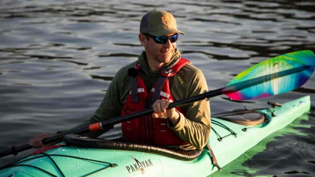In this shot I'm not layering under a top, but the NRS Expedition Weight Hoodie is a perfect example of a water wicking shirt that keeps you warm.