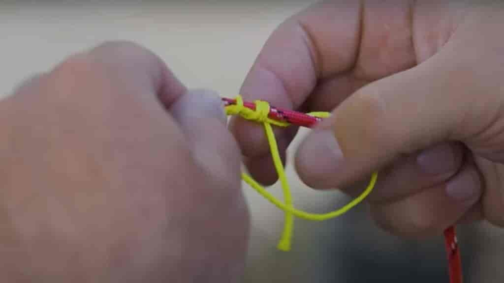 Double Uni Knot Step 3 wrap the small line through the loop 7 times