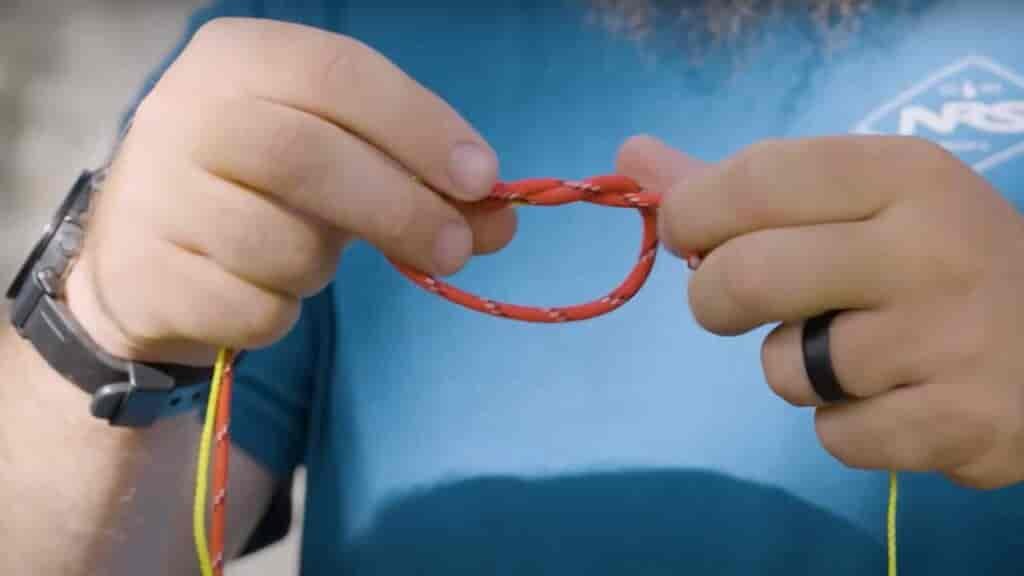 Double Uni Knot Step 6 - wrap that other line around like you did with the thinner line.