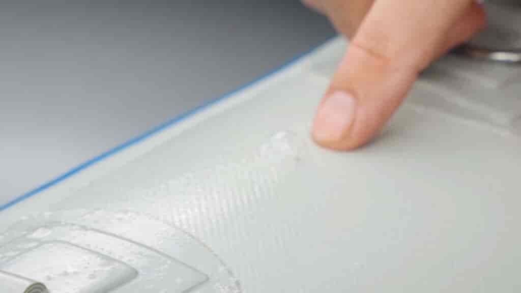 Repairing inflatable boats starts with finding the hole.  A little soapy water will help a lot.