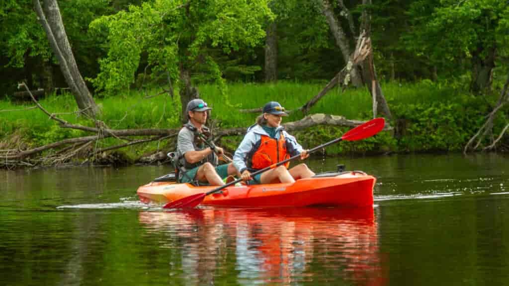 Many tandems don't have rudders, so using opposite strokes helps turn faster.